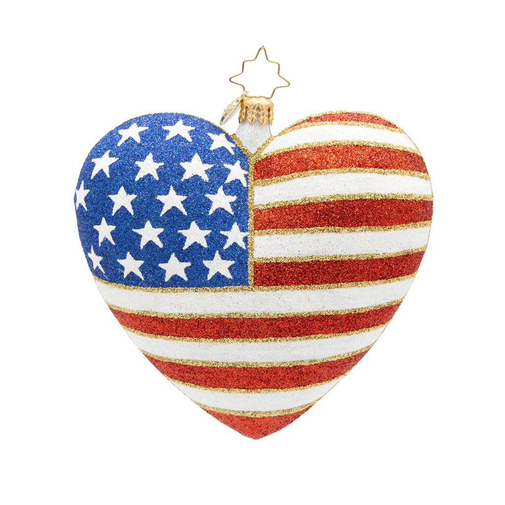 Heart-shaped ornament with American flag design on a white background