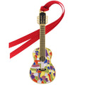 A guitar-shaped ornament with a multicolor mosaic pattern on the body, a black neck, gold-toned headstock and fretboard, and a red hanging ribbon.