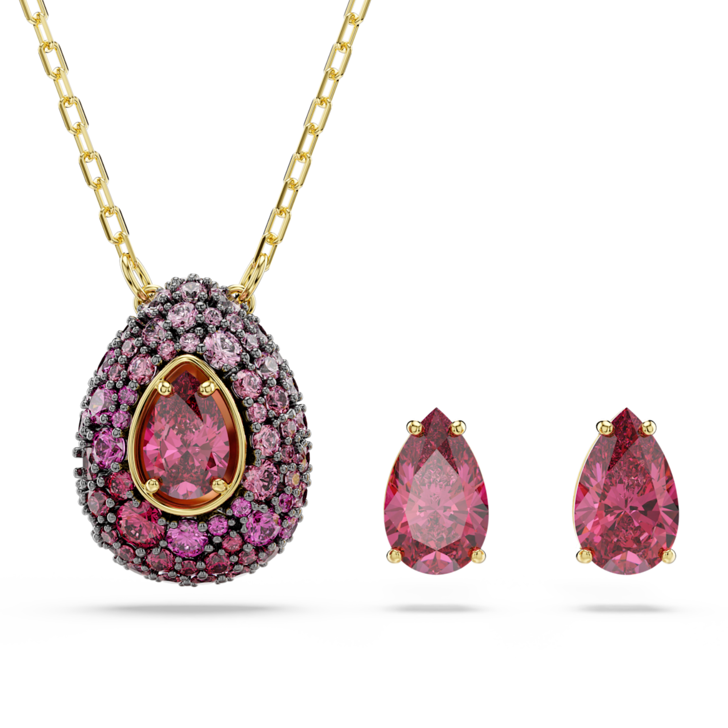 A gold necklace with an egg-shaped pendant and matching teardrop stud earrings, featuring a central pink gemstone surrounded by pink and dark pavé-set stones, shown on a white background.
