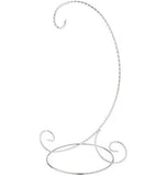 Decorative metal stand with a curved design on a white background