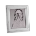 White picture frame with a bride and groom photo inside on a white background