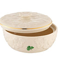 Decorative ceramic bowl with lid featuring a shamrock design on a white background