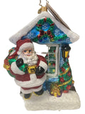 Decorative Christmas ornament with Santa Claus on a sleigh