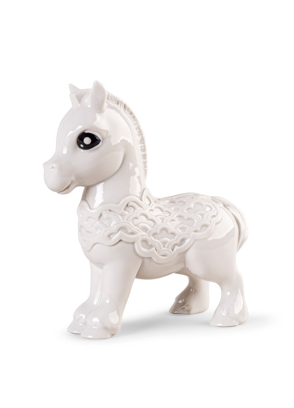 White ceramic horse figurine on a white background