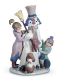 A glossy porcelain figurine of a snowman with children and a dog, with pastel color detailing.